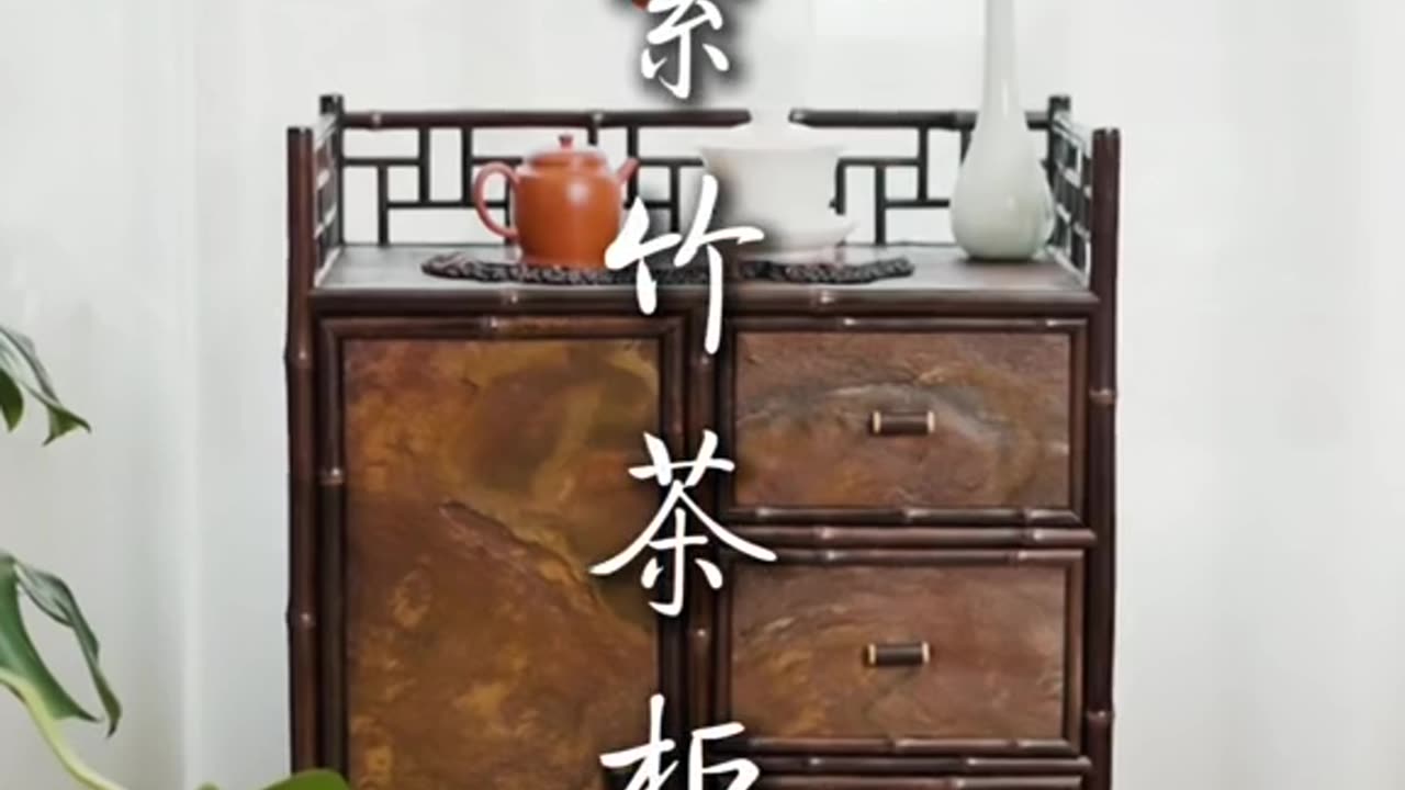 The tea cabinet is made of bamboo, in a classic style