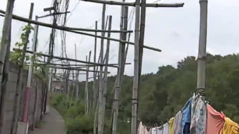 Walking precariously in Kawit, Cavite in the Philippines