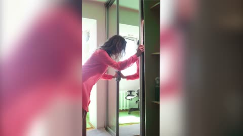 Transparent cleaning mirror with model girl in a dress