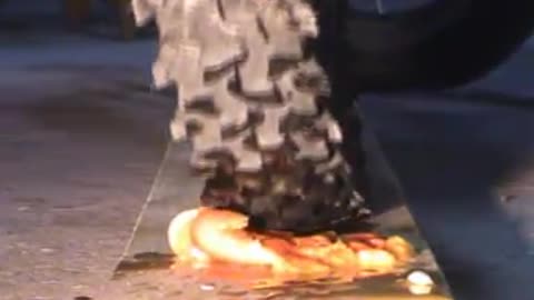 Bike Tire Crushes Orange