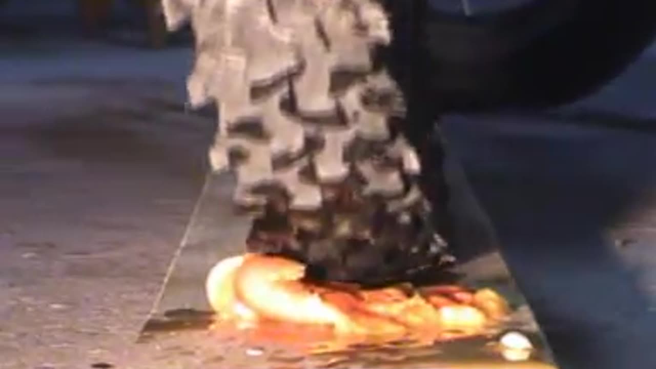 Bike Tire Crushes Orange