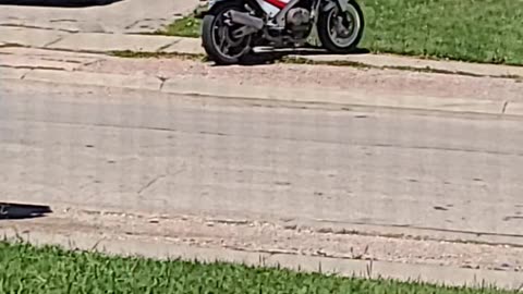 Guy Gets Pushed Off Motorcycle by His Girlfriend