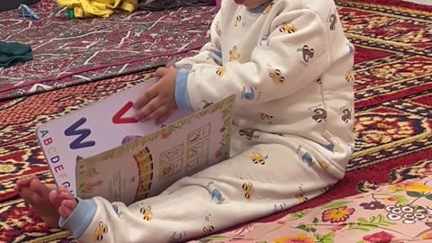 He’s Only 2… But Look How Seriously He’s Studying