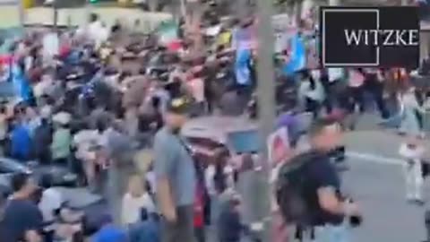 Rioters and now BRANDISHING WEAPONS outside the Federal Building in Los Angeles