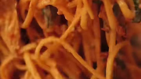 Cooking creamy chicken pasta