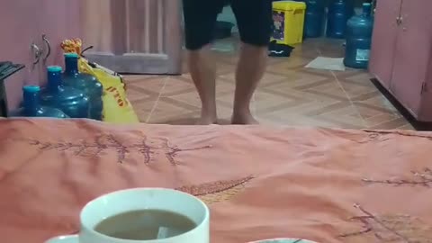 Jumping into coffee cup..