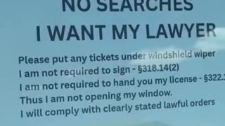 A woman recently went viral for holding up a window sign during a traffic stop,