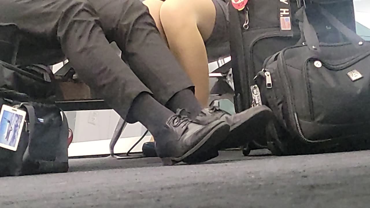 Operation Airhose playing footsie with her boyfriend