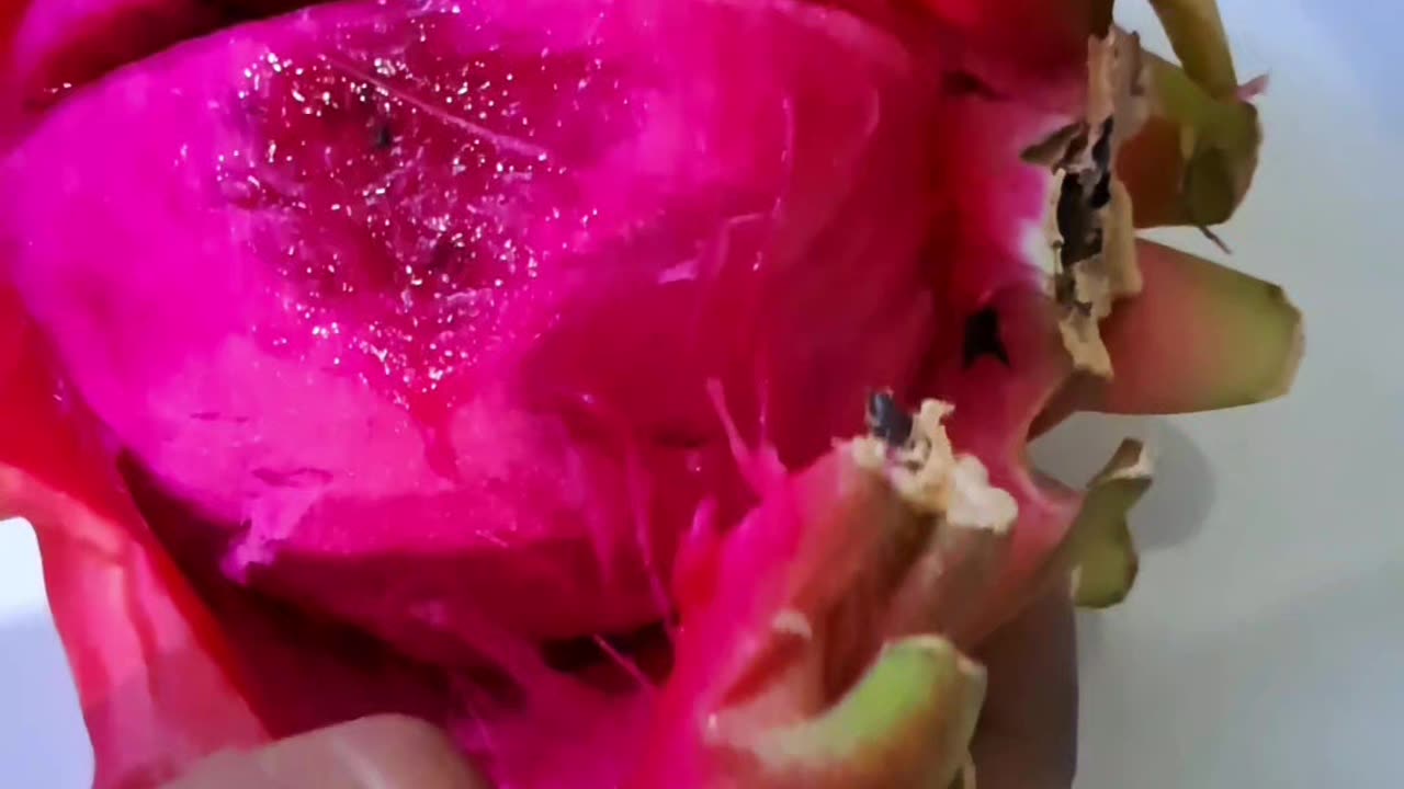 Peeling Dragon fruit