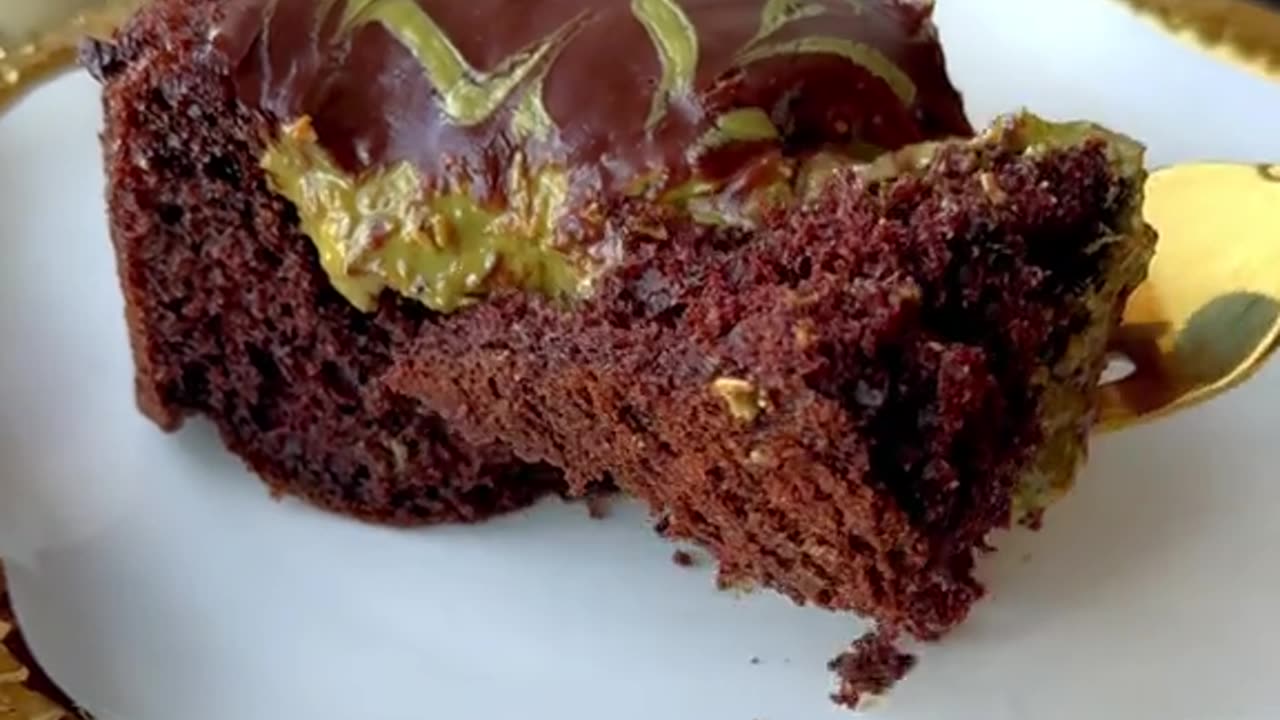 Chocolate Cake With Kataifi, Pistachio Cream And GanacheThis cake features a rich chocolate