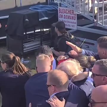 THIS ANGLE OF TRUMP BEING CARRIED OFF IS GOING VIRAL AS MORE PEOPLE START TO NOTICE