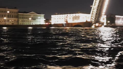 Boat passage at night along the Neva River