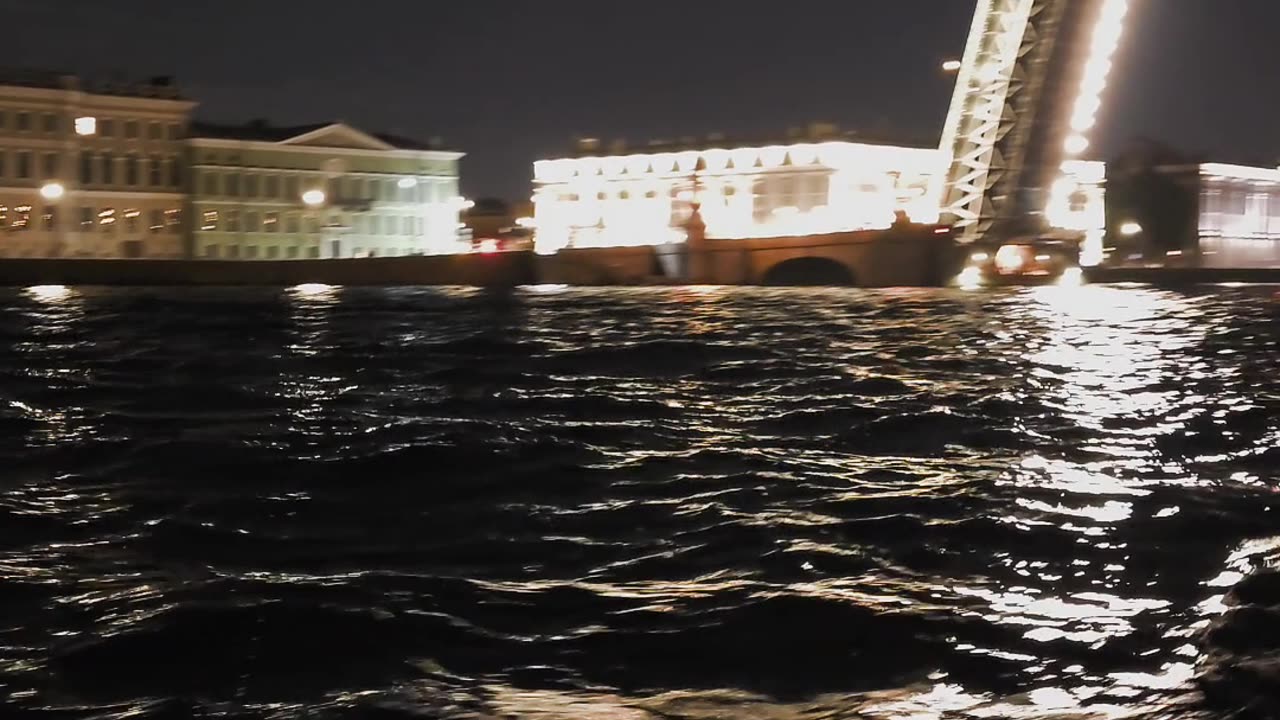 Boat passage at night along the Neva River