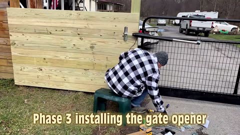 Phase 3 installing the gate opener, "Teamwork, laughter,