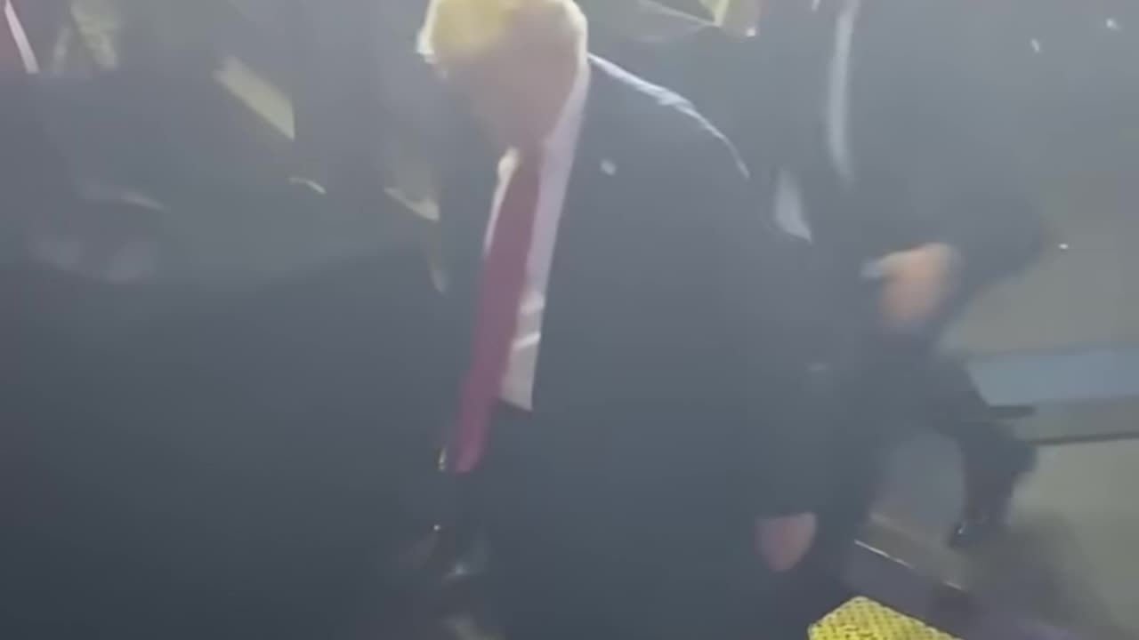 Cell phone throw at Trump