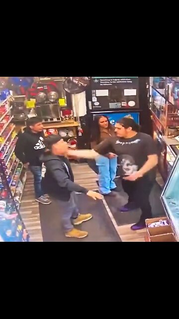 Man gets slapped for touching his girlfriend's ass. Instant Karma. Caught on camera