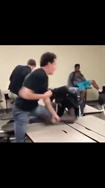 Two college students fight, classmates just watch, caught on camera