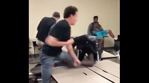 Two college students fight, classmates just watch, caught on camera
