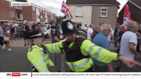 Police separate anti-immigration and anti-racism protesters across the country