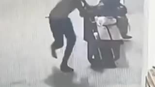 A fake African asylum seeker robs a defenseless woman of her purse and then runs away