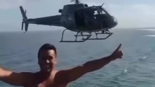 Helicopter pilot helps dude take a cool picture