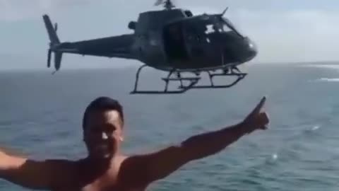 Helicopter pilot helps dude take a cool picture