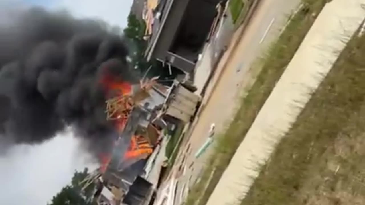 Absolute UNIT of a man walks away from a house exploding with him inside.