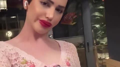 She is dancing and being happy to you