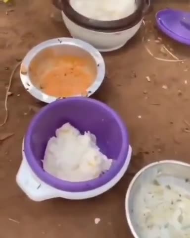 African negro facing his food up with God knows what trash.