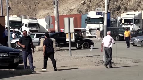 Iranians fleeing country describe life under bombs and no internet