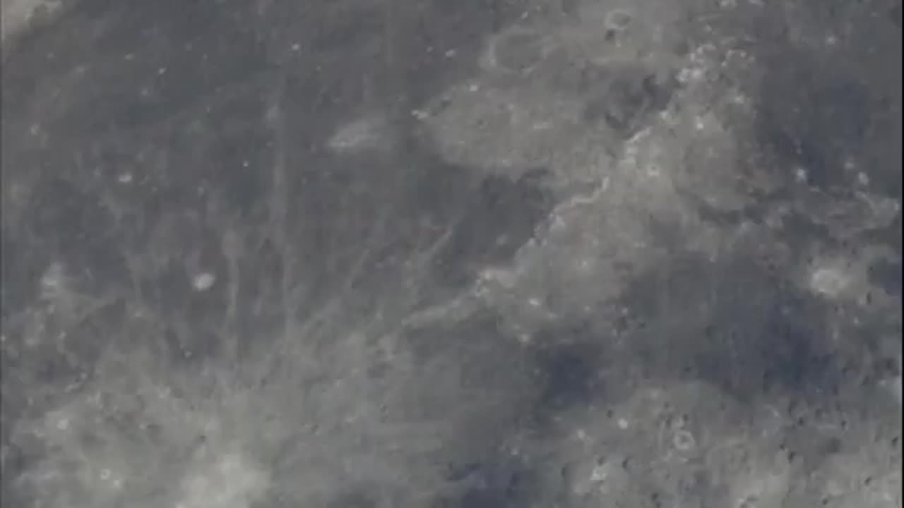 What do you notice about the far side of the moon when zoomed in?