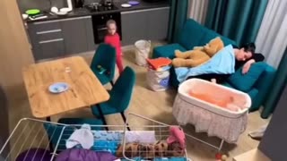 Little girl helps her exhausted mom clean