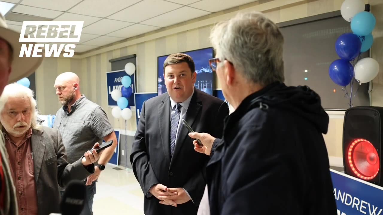 New Conservative MP Andrew Lawton answers questions from reporters