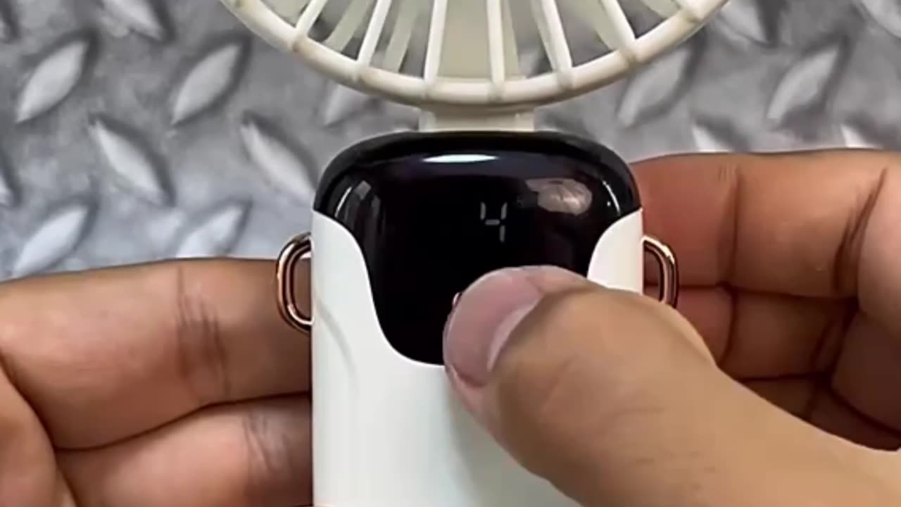 Stay cool on the go! Foldable, 5-speed, USB rechargeable neck fan