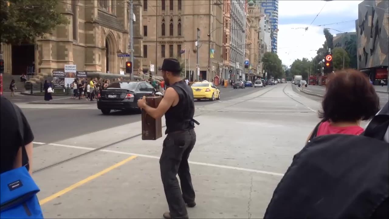 Short Floating Suitcase Show at Melbourne Tram Stop