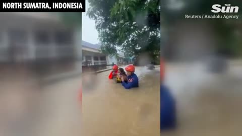 Moment deadly landslide RIPS through Indonesian village as school building collapses