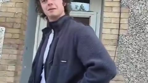 Middle class toff tries to stop Eastwall locals from flying the Irish flag.