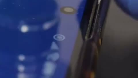 Smartphone phone shownđł under a microscope