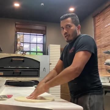 Slow motion pizza toss