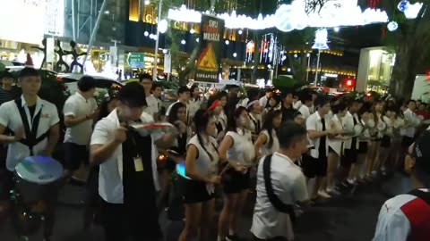 Students from SMU Samba Masala perform and dance in Orchard Road, Singapore