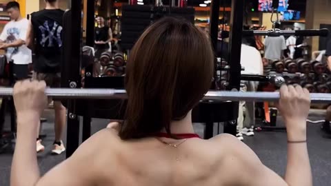 Woman Working Out at the Gym