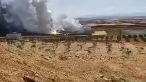 Syrian media reports explosions at a munitions depot at an air defense base near Hama