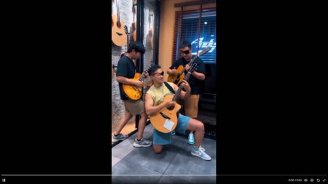 Rock On: These boys can play the guitar. Ever seen this kind of skill?