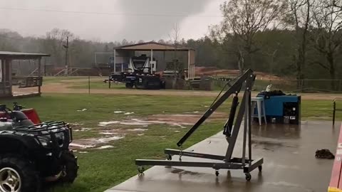 Earlier footage of a tornado on the ground near Kentwood, Louisiana.