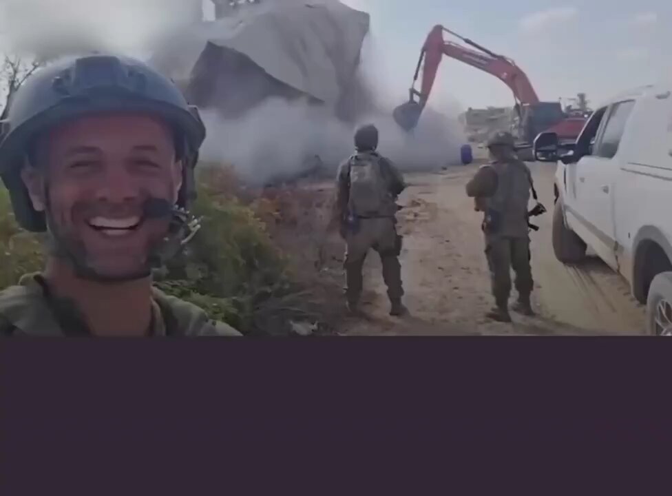 IDF soldier is literally filming him self laughing while a home in Gaza is being destroyed.