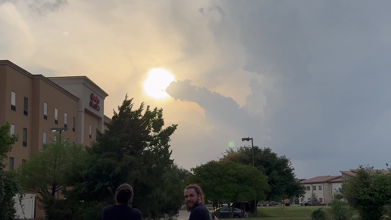 Phallic Cloud Points Toward Sun