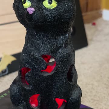 Black Cat Figurine with Glow-in-The-Dark Eyes - 7.3" Spooky Resin Halloween Decorations