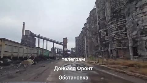 Russian Soldiers Driving Through Ruins of Occupied Avdiivka