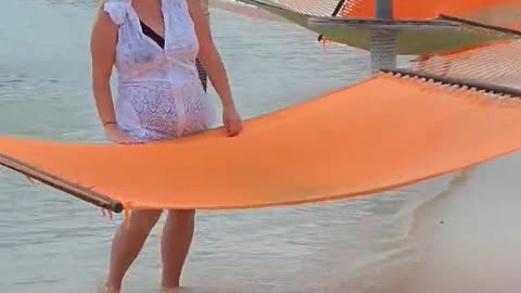 Vacationing Woman Flipped By Beach Hammock