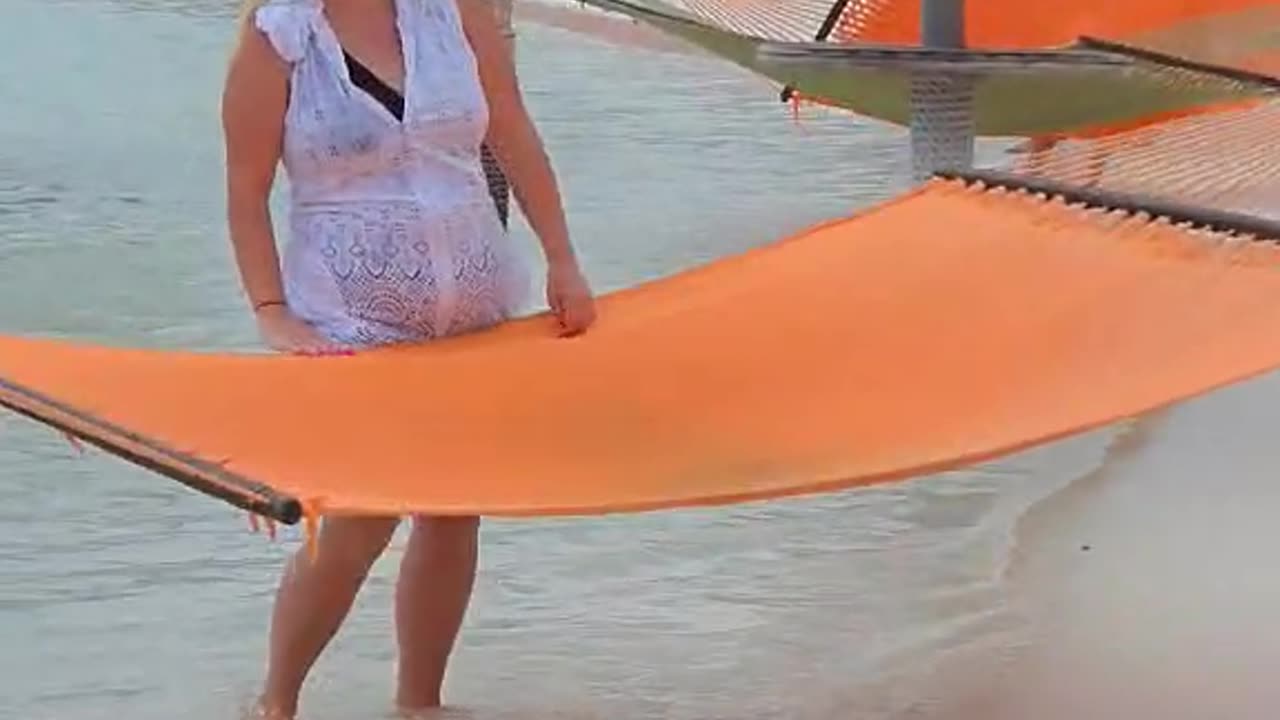 Vacationing Woman Flipped By Beach Hammock